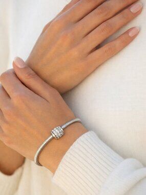 Silver-tone Pandora style bangle bracelet with CZ charm